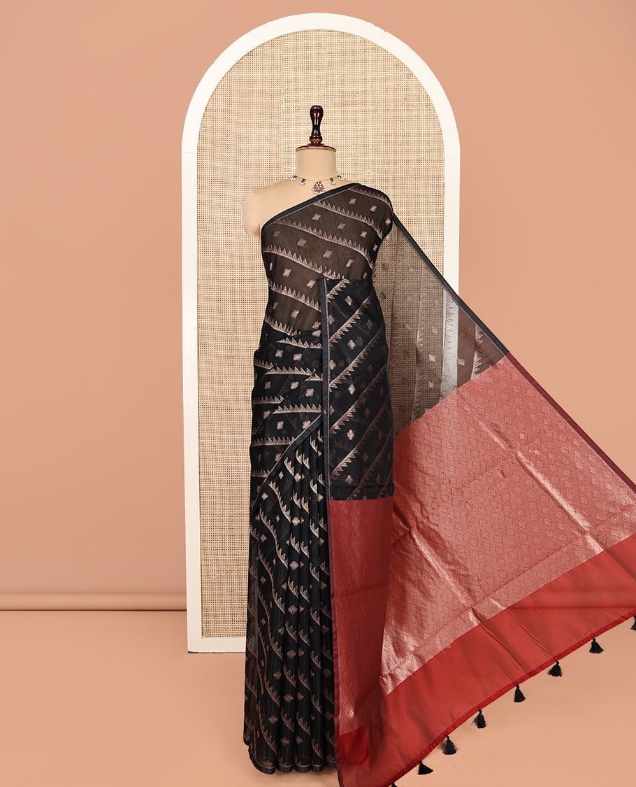 Borderless Black Chanderi Cotton Saree, Adorned with Zari Buttas and Temple Stripes on Its Body, Complemented by Contrast Pallu of Jaal Designs, and Paired with a Contrast Jacquard Blouse