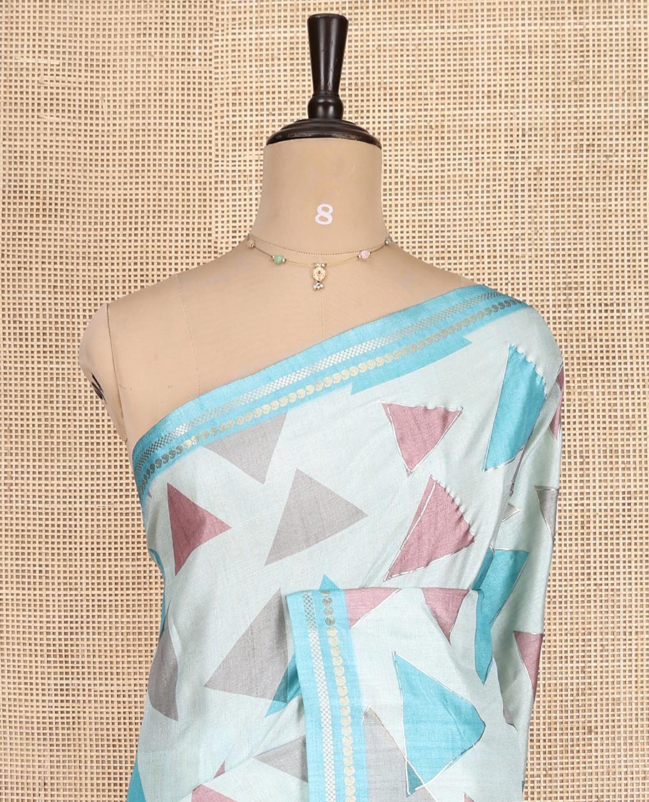Sky Blue Fancy Tussar Silk Saree Features Triangle Motifs, Zari Border, Striped Pallu, Matching Blouse