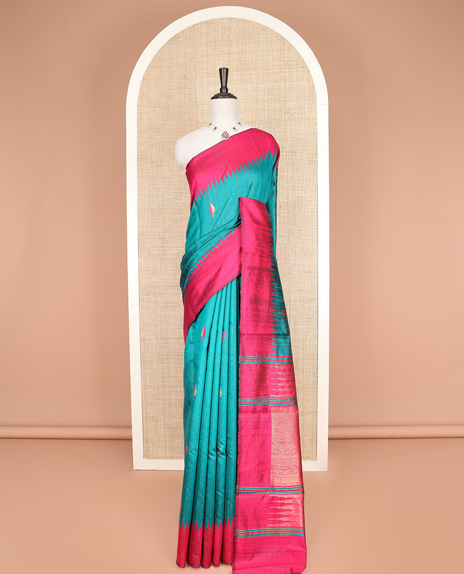 Green Dupion Silk Saree Adorned with Bud Buttas All Over Its Body, Complemented by a Contrast Temple Border, Pallu Depicting Traditional Designs, and Paired with a Contrast Blouse