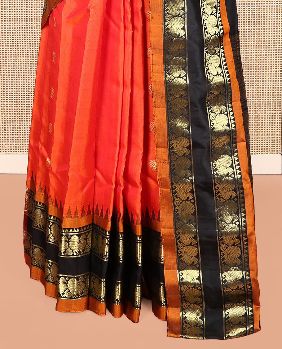Orange Gadwal Silk Saree, Embellished with Peacock Buttas, Complemented by a Contrast Peacock Motifs Woven Temple Border, Grand Jaal Pallu, and a Contrast Blouse