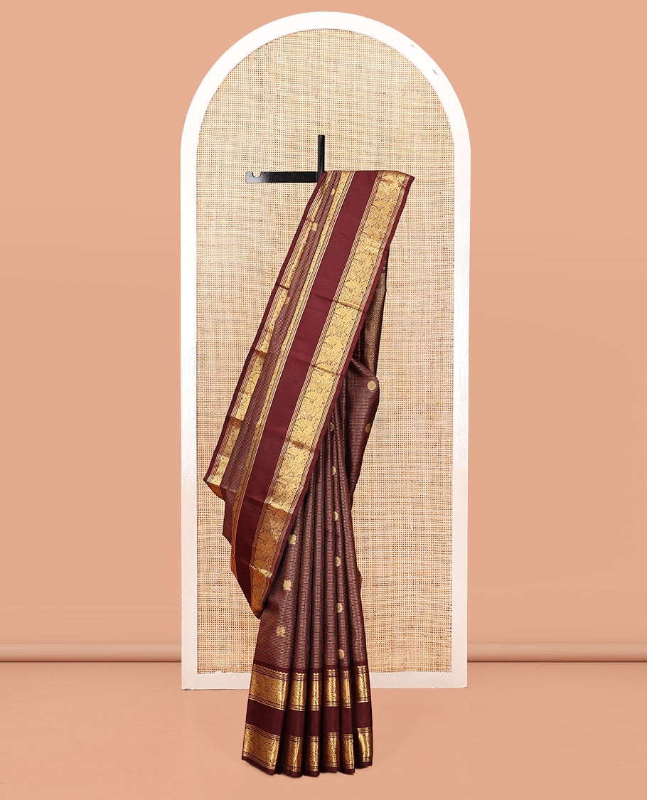 Maroon Kanchipuram Silk Saree, Majestically Detailed with Mayil-Chakra Buttas and Checks, Highlighted by Zari Border of Salngai, and Mayil Designs, Jaal Pallu, and Matching Blouse