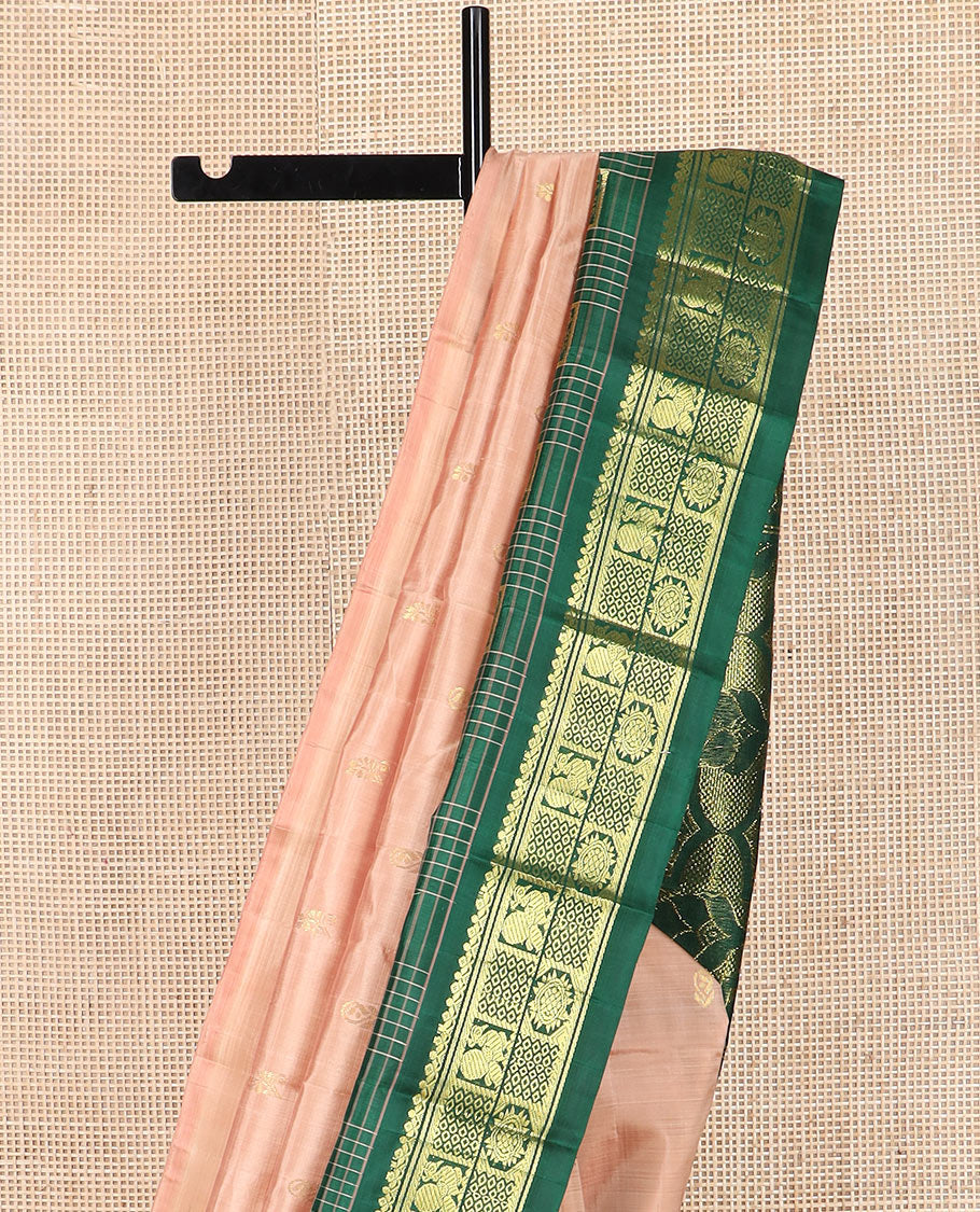 Peach zari buttas Kanchipuram silk saree, contrast one-sided thazampoo rekku checked border of salngai, banaras, mayil chakra and then kuli kann designs, and zari design pallu