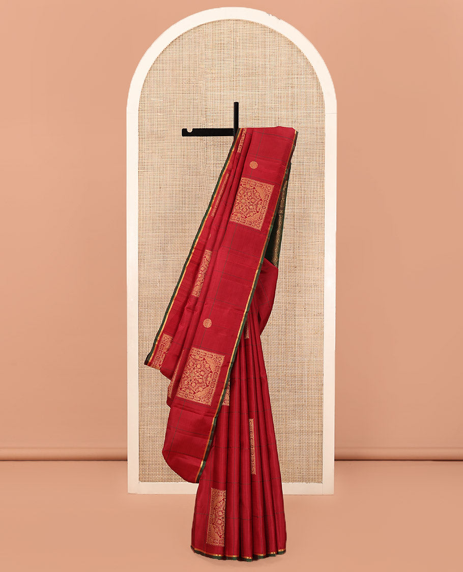 Borderless Red Kanchipuram Silk Saree, Accentuated with Big Decorated Square Buttas Enclosed Checks on its Body, Complemented by a Contrast Pallu of Jaal Designs, and Paired with a Contrast Blouse