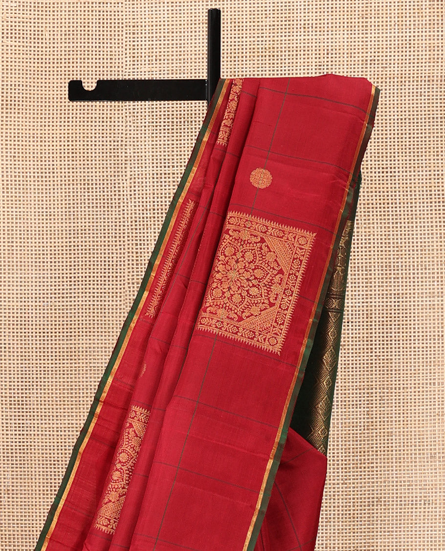 Borderless Red Kanchipuram Silk Saree, Accentuated with Big Decorated Square Buttas Enclosed Checks on its Body, Complemented by a Contrast Pallu of Jaal Designs, and Paired with a Contrast Blouse