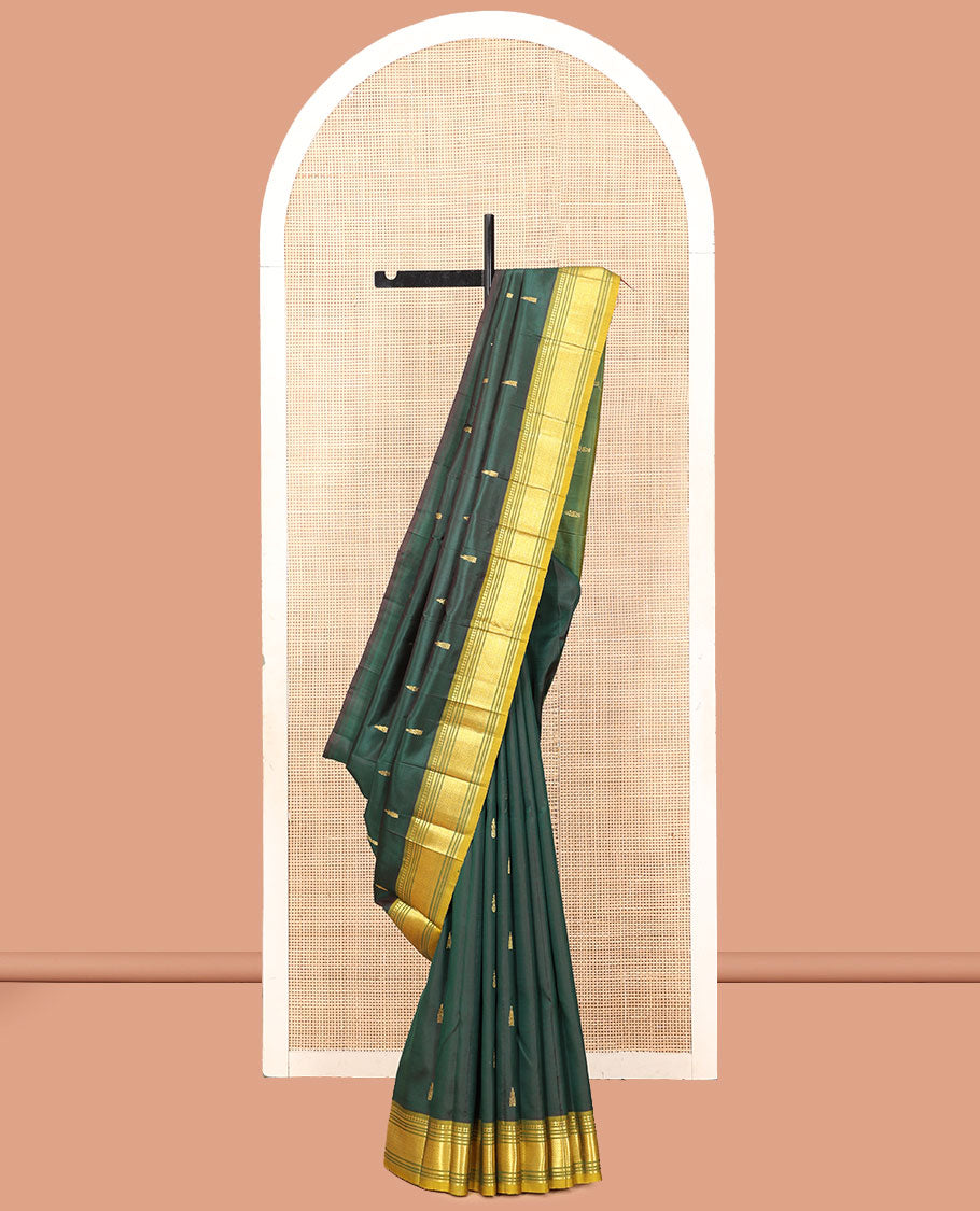 Green Kanchipuram Silk Saree, Detailed with Zari Buttas, a Contrast One-Sided Border of Paneer Sombu, Banaras, Muthu, and Mayil Kann Designs, a Zari Design Pallu, and No Blouse