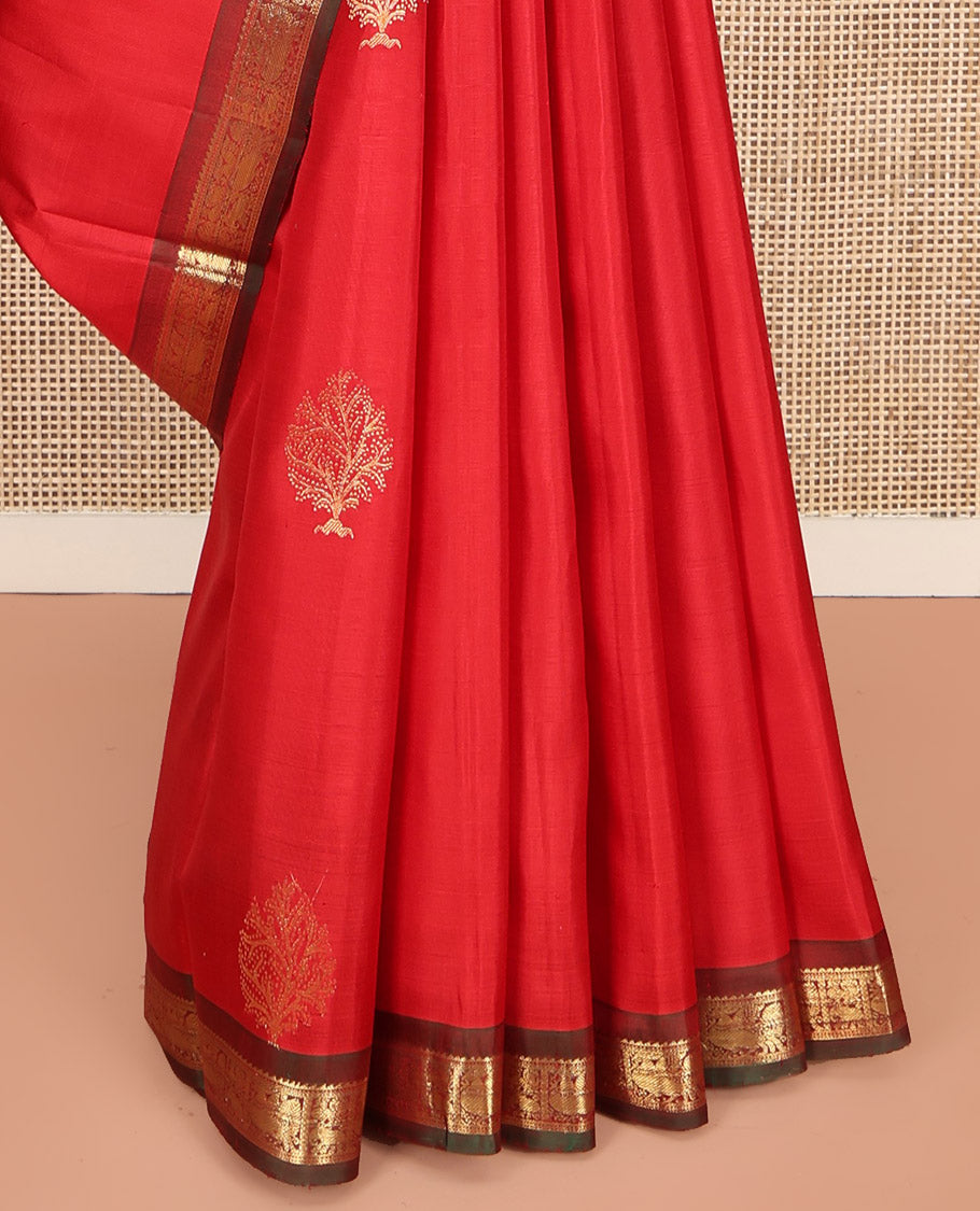 Red Kanchipuram Silk Saree, Decked Up with Zari Buttas All Over Its Body, Complemented by a Contrast Border of Ara Bogudi, Yaanai, and Annam Designs, Grand Pallu, and Paired with a Contrast Blouse