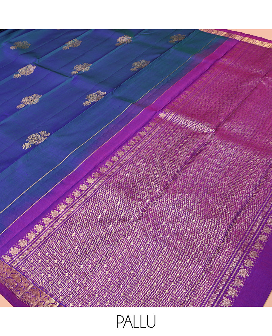 Blue Kanchipuram Silk Saree, Uniquely Designed with Zari Buttas on Its Body, Complemented by Contrast Border of Rekku, Thazampoo Rekku, and Annam Designs, Intricately Designed Pallu, and Paired with a Contrast Blouse