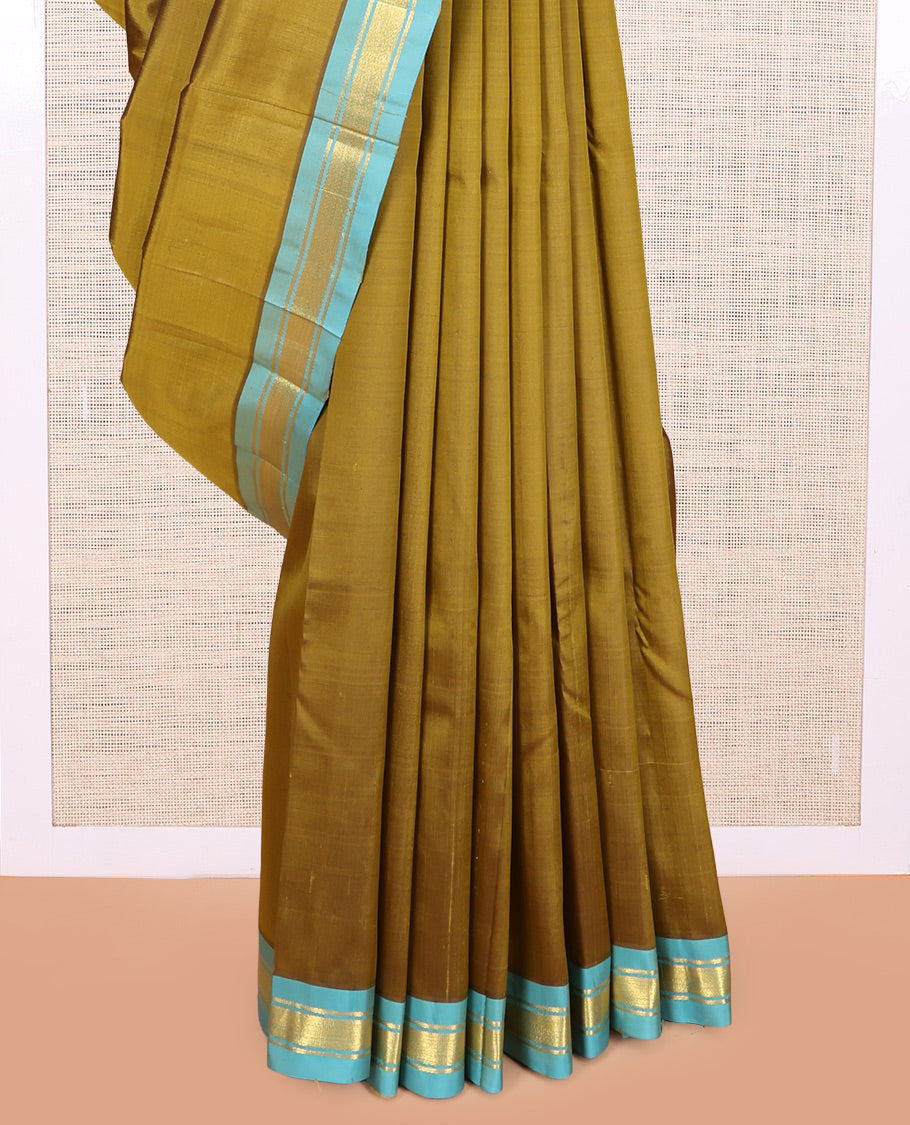 Green Plain Kanchipuram Silk Saree, a Contrast Zari One-sided Border, Zari Striped Pallu, and No Blouse