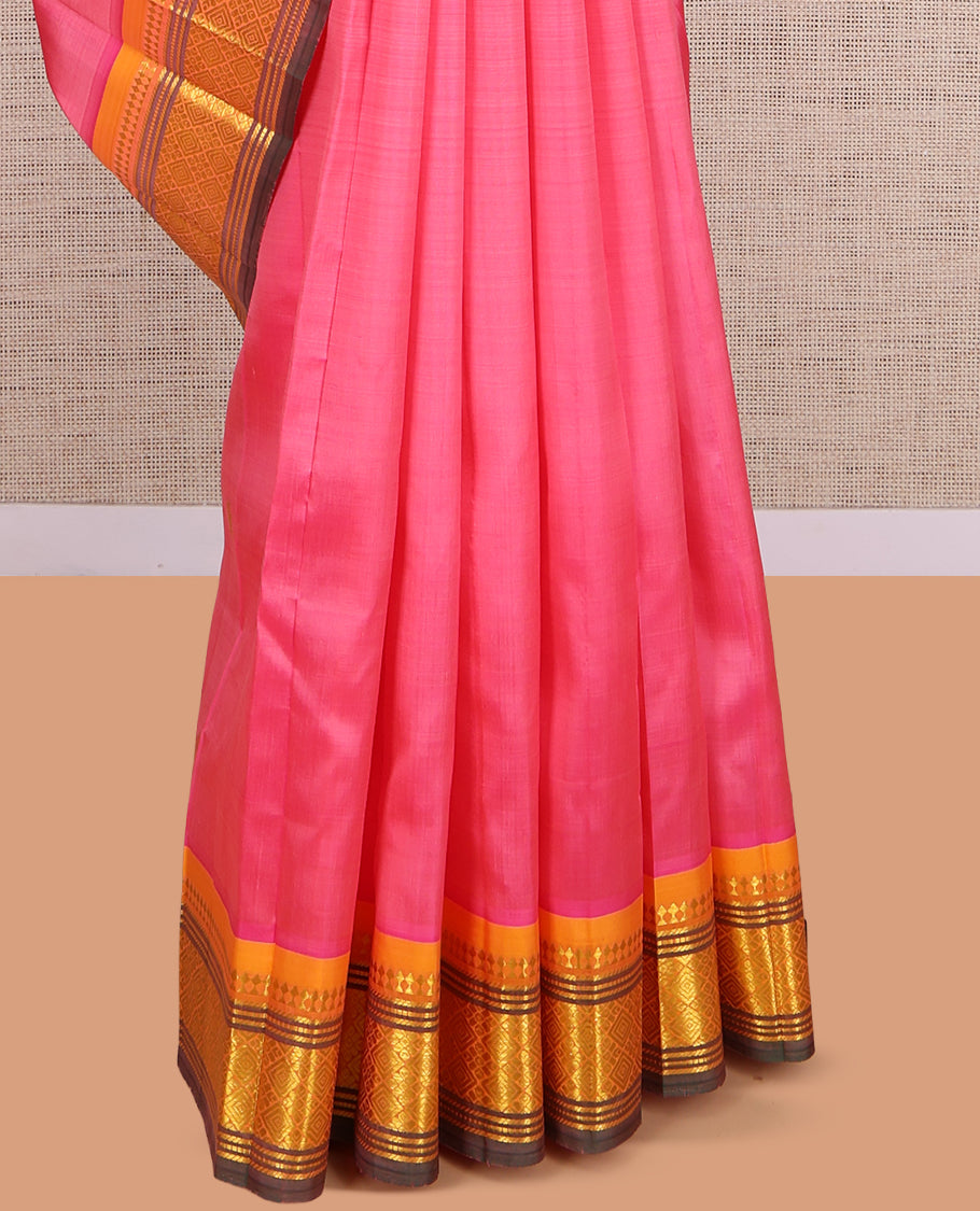 Pink Kanchipuram Silk Saree, Ornamented with Zari Buttas, a Contrast One-Sided Border of Paneer Sombu, Banaras, Muthu, and Jaal Design, Zari Design Pallu, and No Blouse