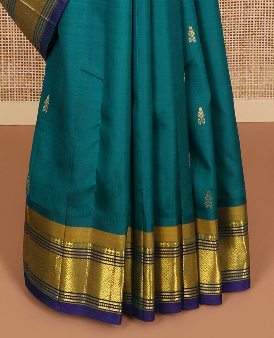 Green floral buttas kancheepuram silk saree with contrast border of banaras, muthu, checked design border & zari design pallu