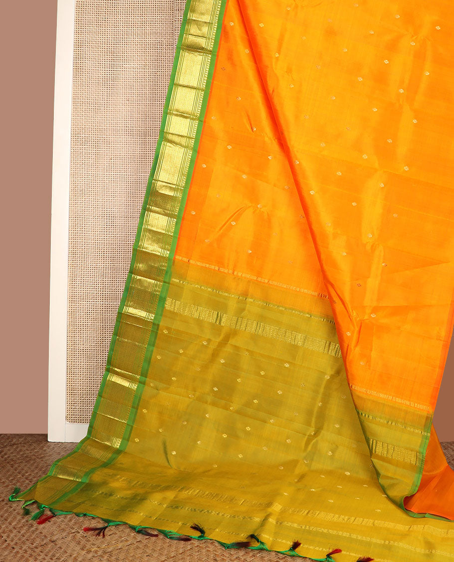 Orange zari buttas Kanchipuram silk saree, contrast border of panner sombu, banaras, muthu & mayil kann & zari design pallu