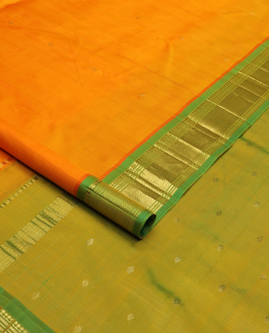 Orange zari buttas Kanchipuram silk saree, contrast border of panner sombu, banaras, muthu & mayil kann & zari design pallu