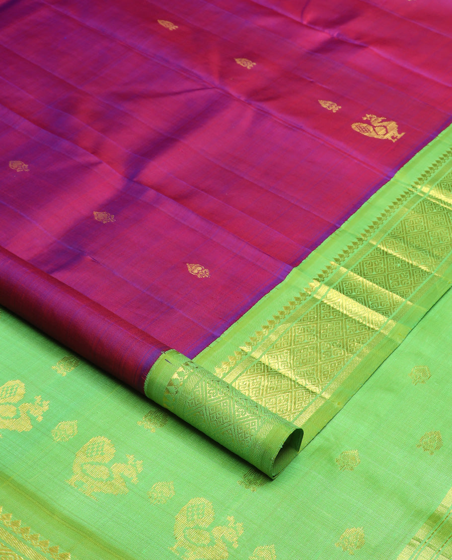 Purple zari buttas Kanchipuram silk saree, contrast one-sided korvai border of thilakam mokku, banaras, and jaal design, and zari design pallu
