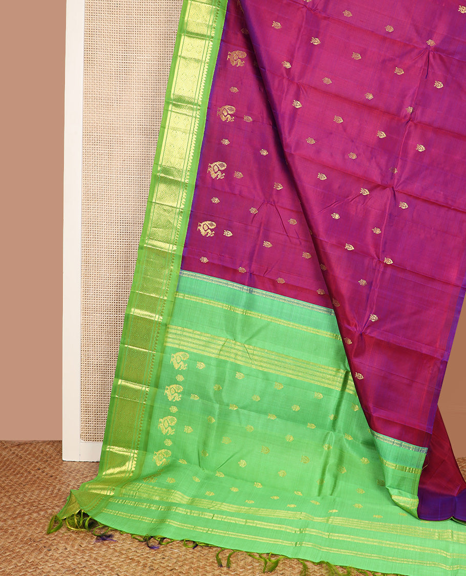 Purple zari buttas Kanchipuram silk saree, contrast one-sided korvai border of thilakam mokku, banaras, and jaal design, and zari design pallu