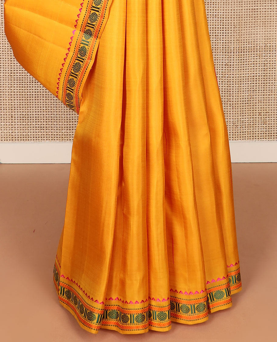 Yellow malli mokku buttas Kanchipuram silk saree, self-border of rekku, muthu, kathir, and rudraksham motifs, and seppu rekku pallu