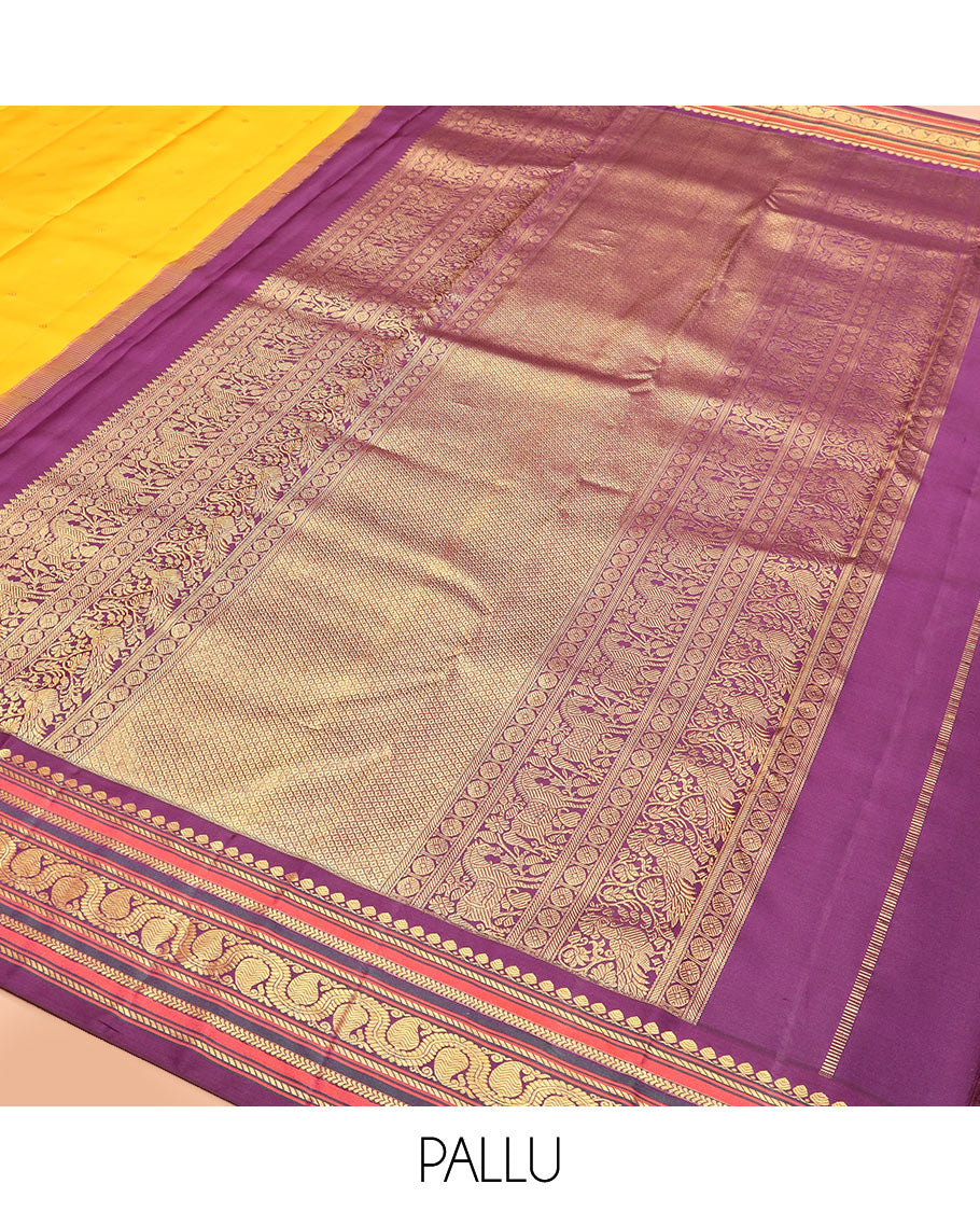 Yellow zari buttas Kanchipuram silk saree, contrast border of thilakam mokku, banaras, kathir, and dhavana manga designs, and mayil kann design pallu