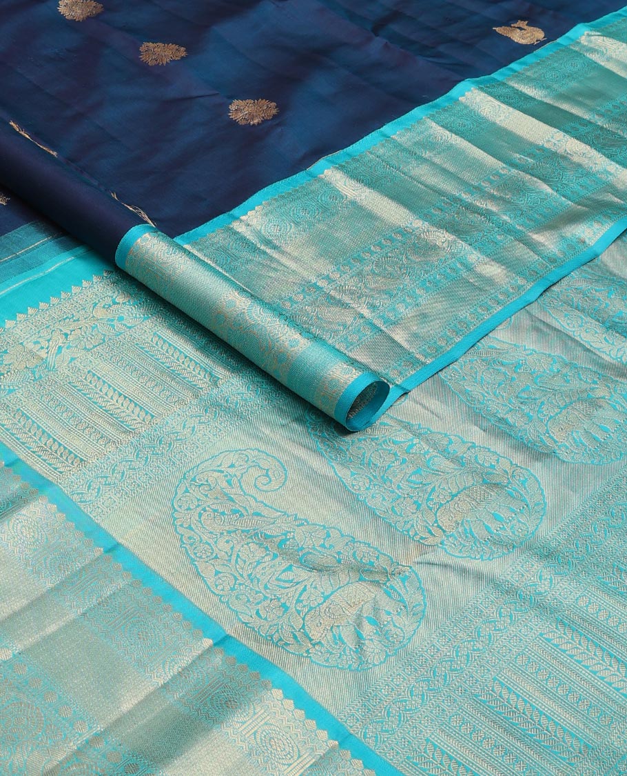 Blue zari buttas silk saree, contrast border of thilakam mokku,neli,mayil chakram,mayil kann & rudraksham & intricate pallu