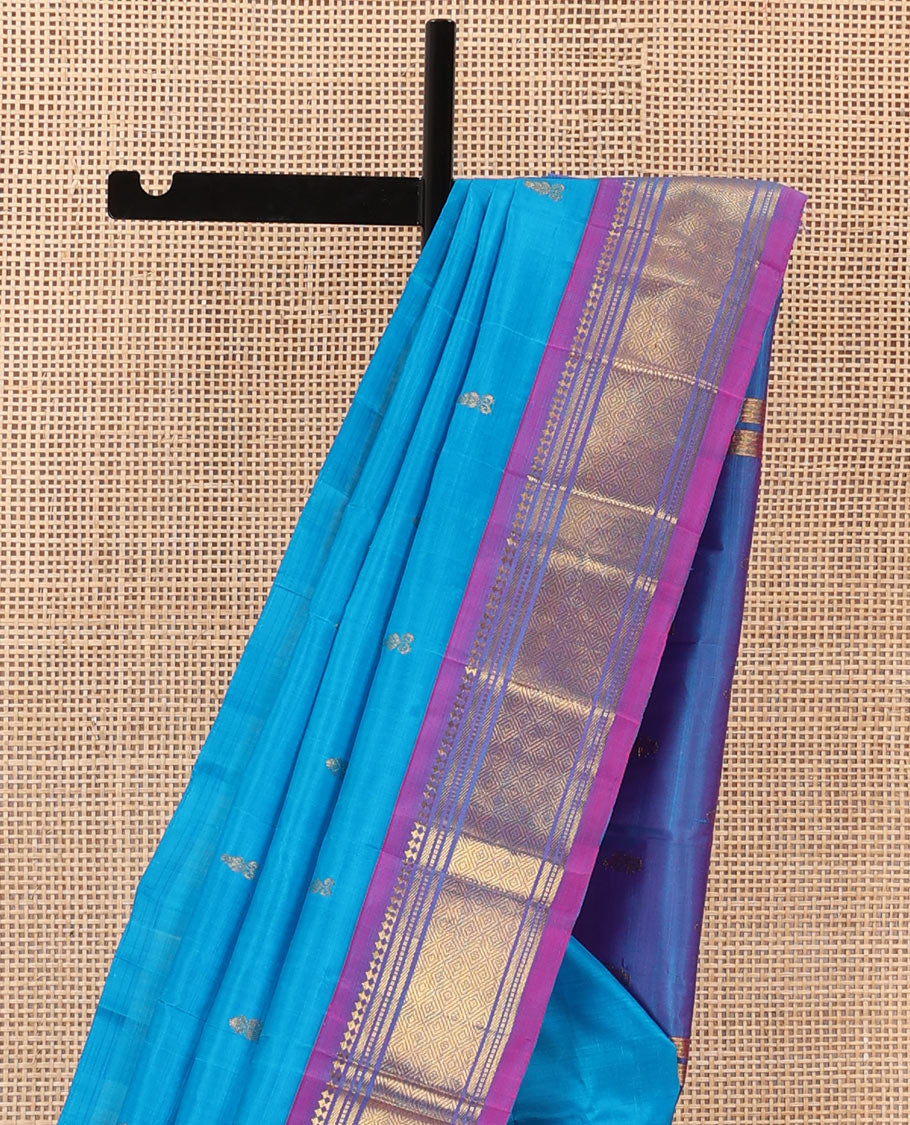 Aszure blue zari buttas Kanchipuram silk saree, contrast one-sided border of panner sombu, muthu, banaras, and jaal, and zari design pallu