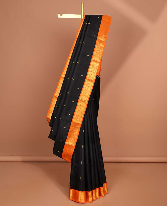 Black floral buttas kancheepuram silk saree with intricate zari pallu & korvai border of thilakam mokku,banaras, mayil designs