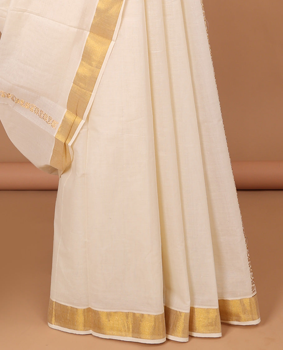 Cream kerala saree with zari stripes, zari border & pallu of intricate designs