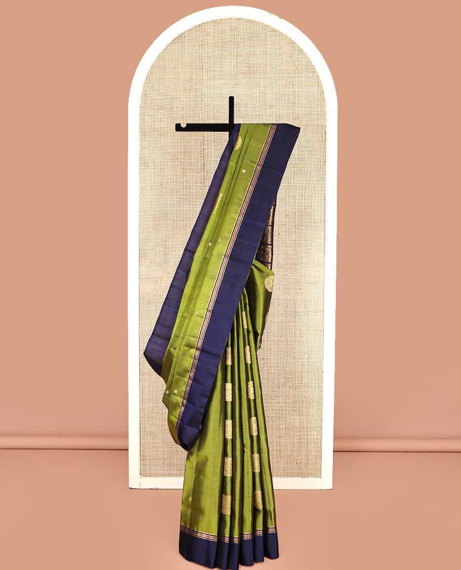 Green Mayuri Lite Silk Mix Saree, Gleamed Up with Square Buttas All Over Its Body, Complemented by Contrast Border, Intricately Designed Pallu, and Paired with a Contrast Blouse