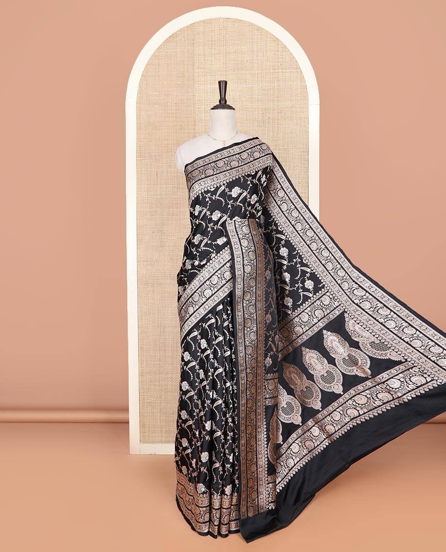Black floral vine jacquard mushru silk saree, floral-paisley design zari border, and intricate pallu