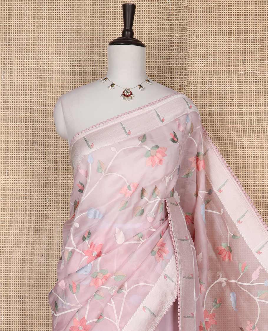 Light pink floral embroidery organza saree with self motifs border