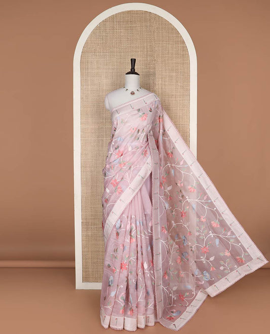 Light pink floral embroidery organza saree with self motifs border