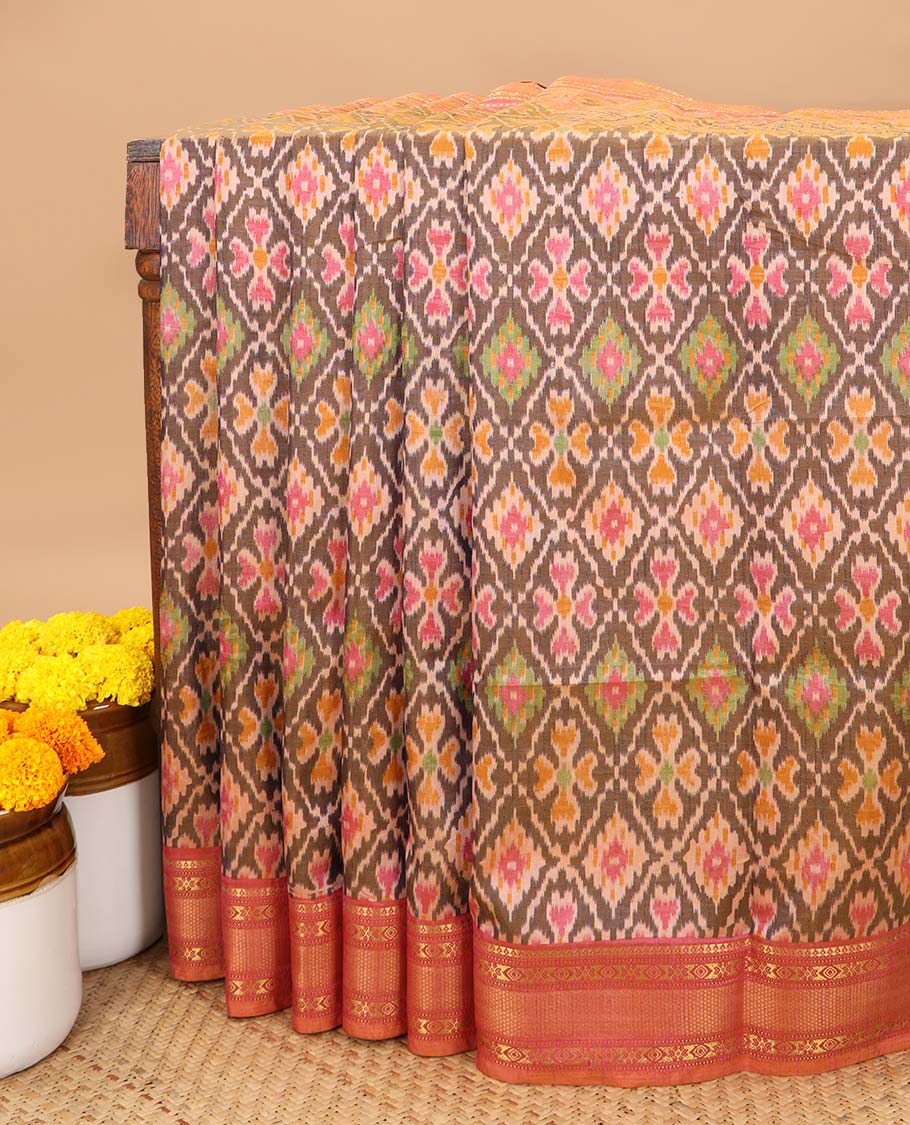 Brown with pink pochampalli printed design semi patola silk saree, contrast gold zari jacquard border & printed rich pallu along with plain blouse