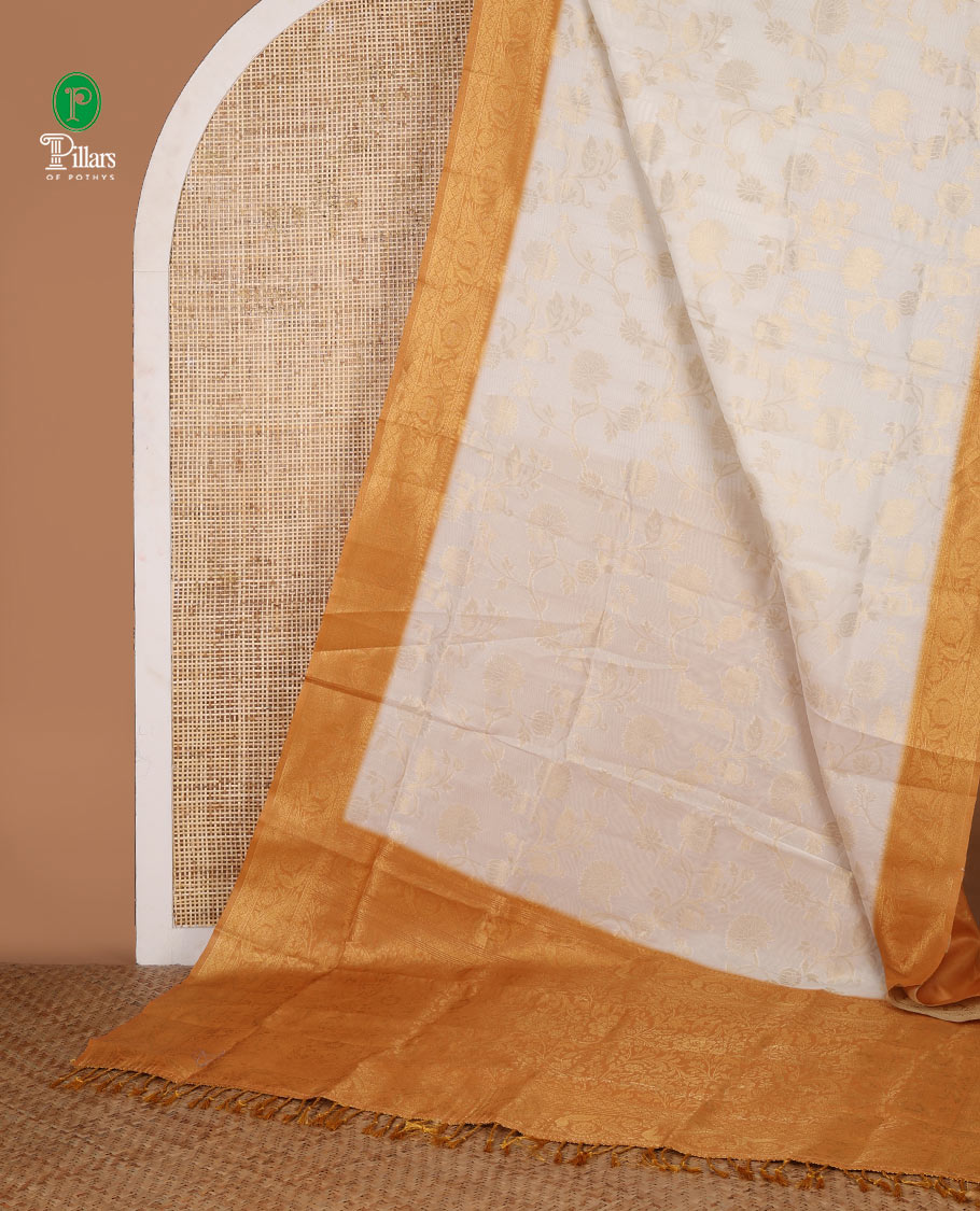 Cream with mustard zari jall weaving design banaras brasso saree with contrast jacquard border & weaving pallu along with butta design blouse