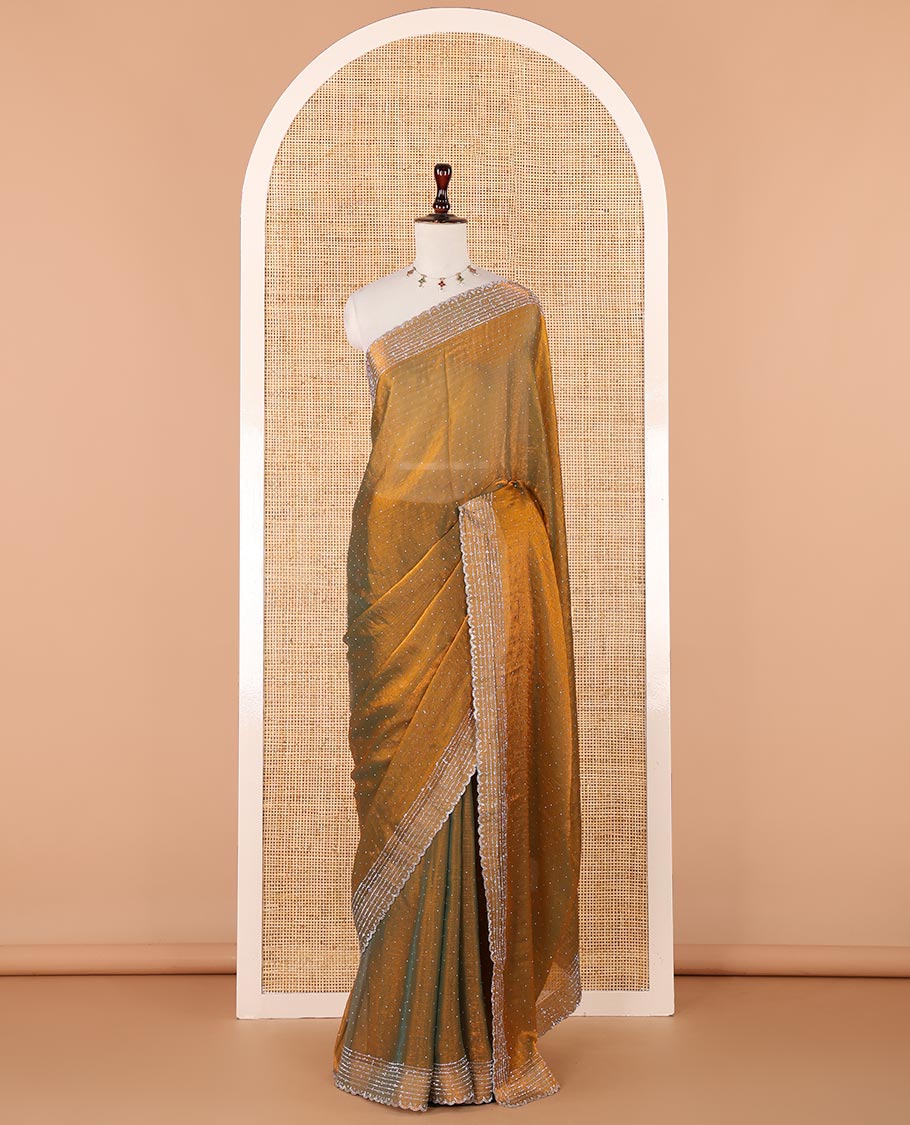 Mehendi green Swarovski crystal stonework Fendy chiffon saree,scallop stonework border & contrast purple stonework blouse