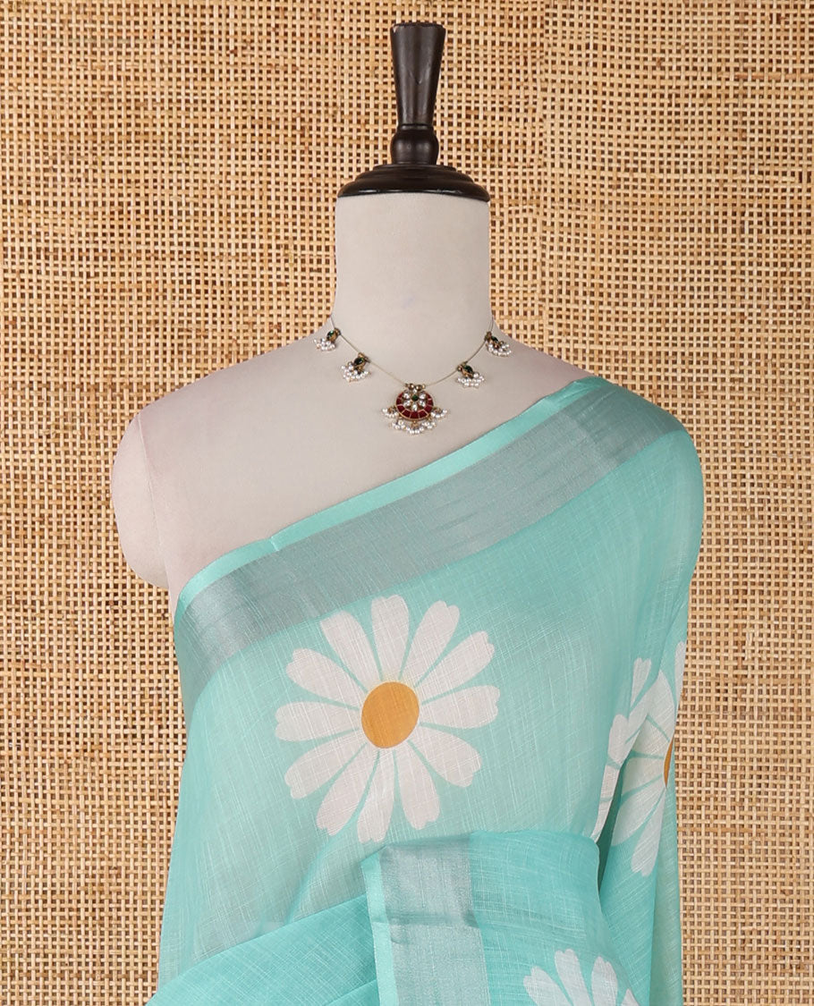 Peacock green sunflower motif printed linen saree, silver zari plain border & small sunflower motif print blouse