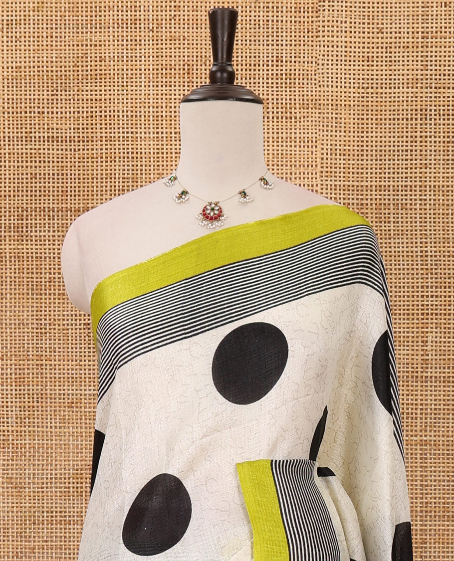 Cream polka dot printed khadi cotton saree, contrast piping border with stripes print, stripes printed pallu & green stripes printed blouse