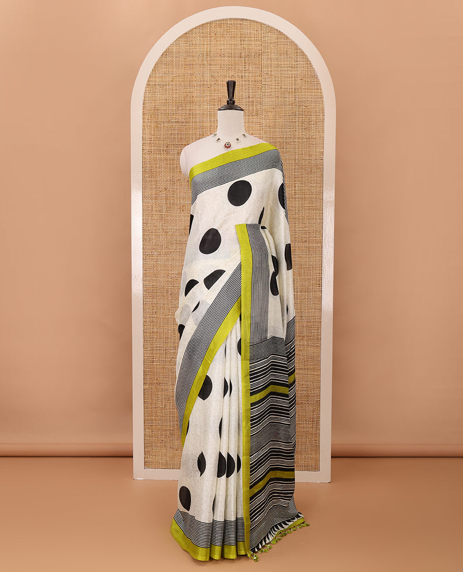 Cream polka dot printed khadi cotton saree, contrast piping border with stripes print, stripes printed pallu & green stripes printed blouse