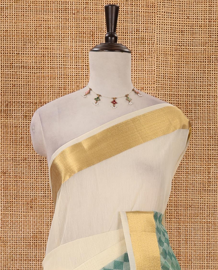 Cream with rama green kerala cotton saree , diamond style printed with gold zari tissue bawanchi border & diamond pattern printed pallu with plain blouse