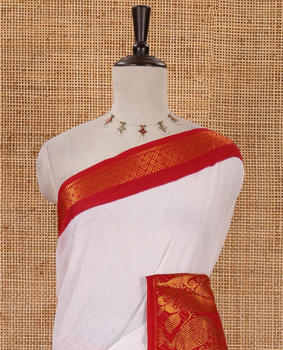 White plain sungudi cotton saree, contrast big annam motifs woven zari border, zari striped pallu & zari design blouse