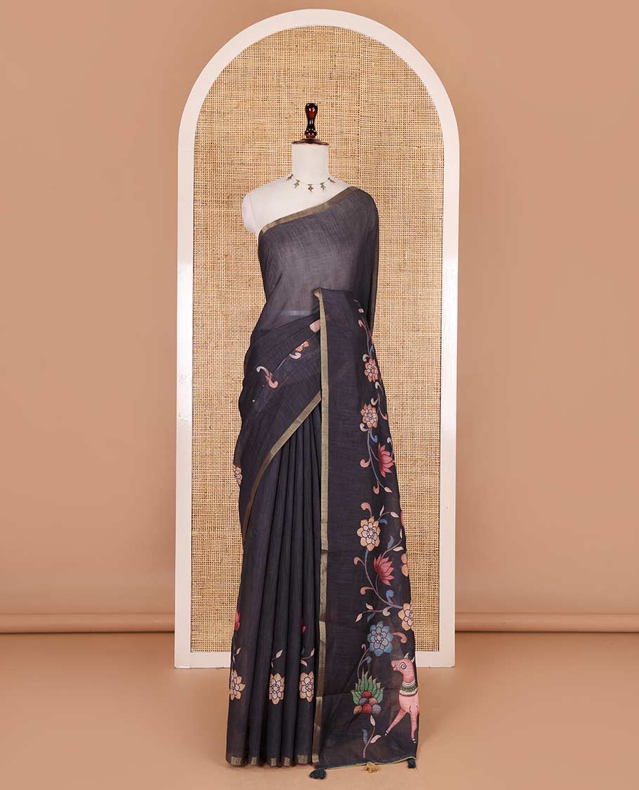 Black kalamkari floral vine, horse, and deer motifs printed linen cotton saree, piping border, printed pallu, and a contrast printed blouse