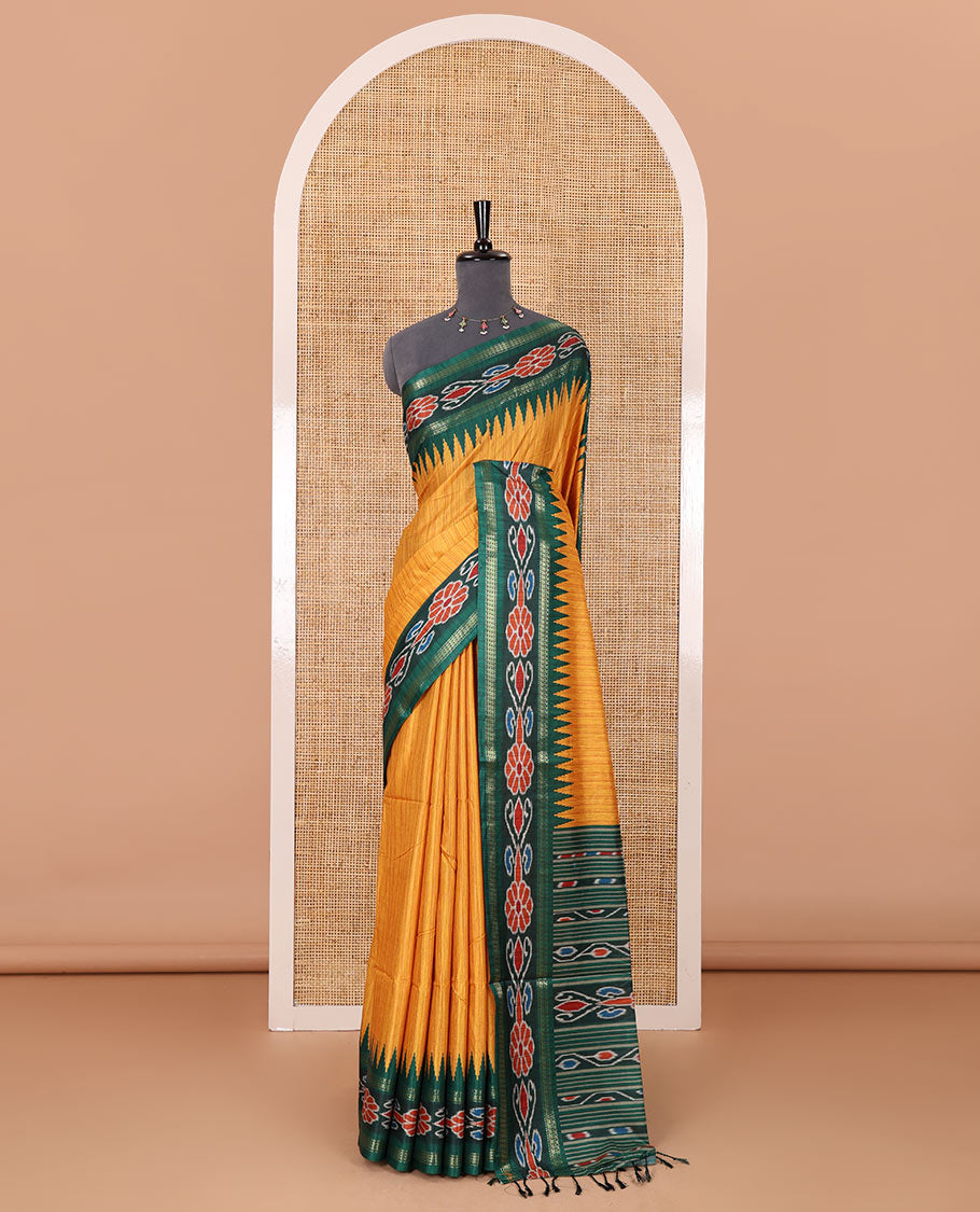 Yellow plain Katan silk saree, contrast temple ikkat floral printed border, ikkat floral printed pallu, and ikkat printed blouse