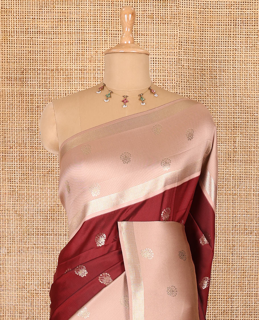 Maroon zari buttas soft silk saree, contrast zari border of intricate designs, zari-rich jaal pallu, and a contrast zari design blouse
