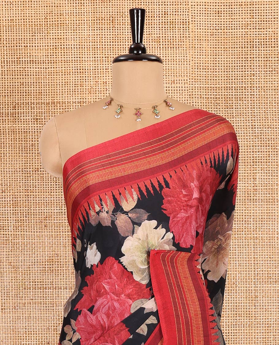 Black floral printed Italian crepe saree, contrast temple printed border, striped pallu, and a printed bordered blouse