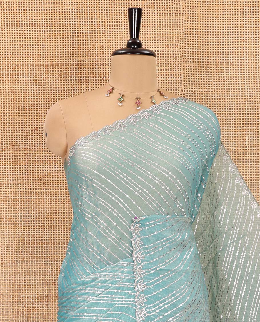 Blue diagonal striped foli printed shimmer chiffon saree, scallop jarkan stone work border, self-pallu, and plain blouse