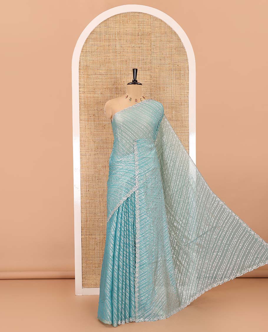 Blue diagonal striped foli printed shimmer chiffon saree, scallop jarkan stone work border, self-pallu, and plain blouse
