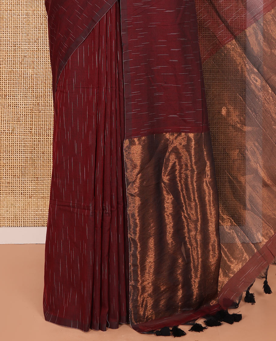 Borderless Maroon Khadi Mul Cotton Saree Decked with Jharna-Style Waterdrop Motifs, Featuring a Gleaming Zari-Woven Pallu, Paired with a Matching Blouse Replicating the Body Motifs