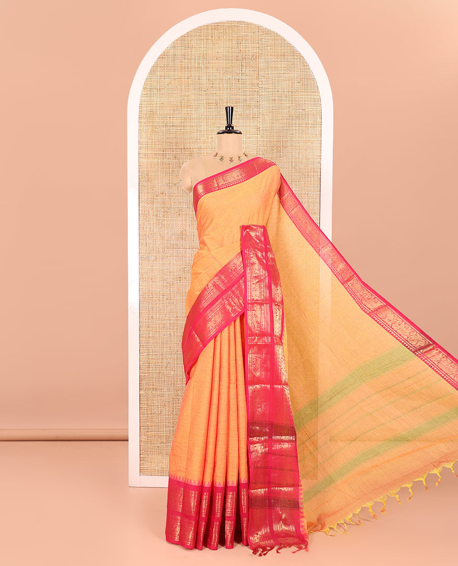 Orange Plain Chettinad Cotton Saree Highlighted with a Contrasting Temple Rettai Pettu Border of Peacock-Elephant Motifs, a Subtle Pallu of Stripes, and a Matching Blouse