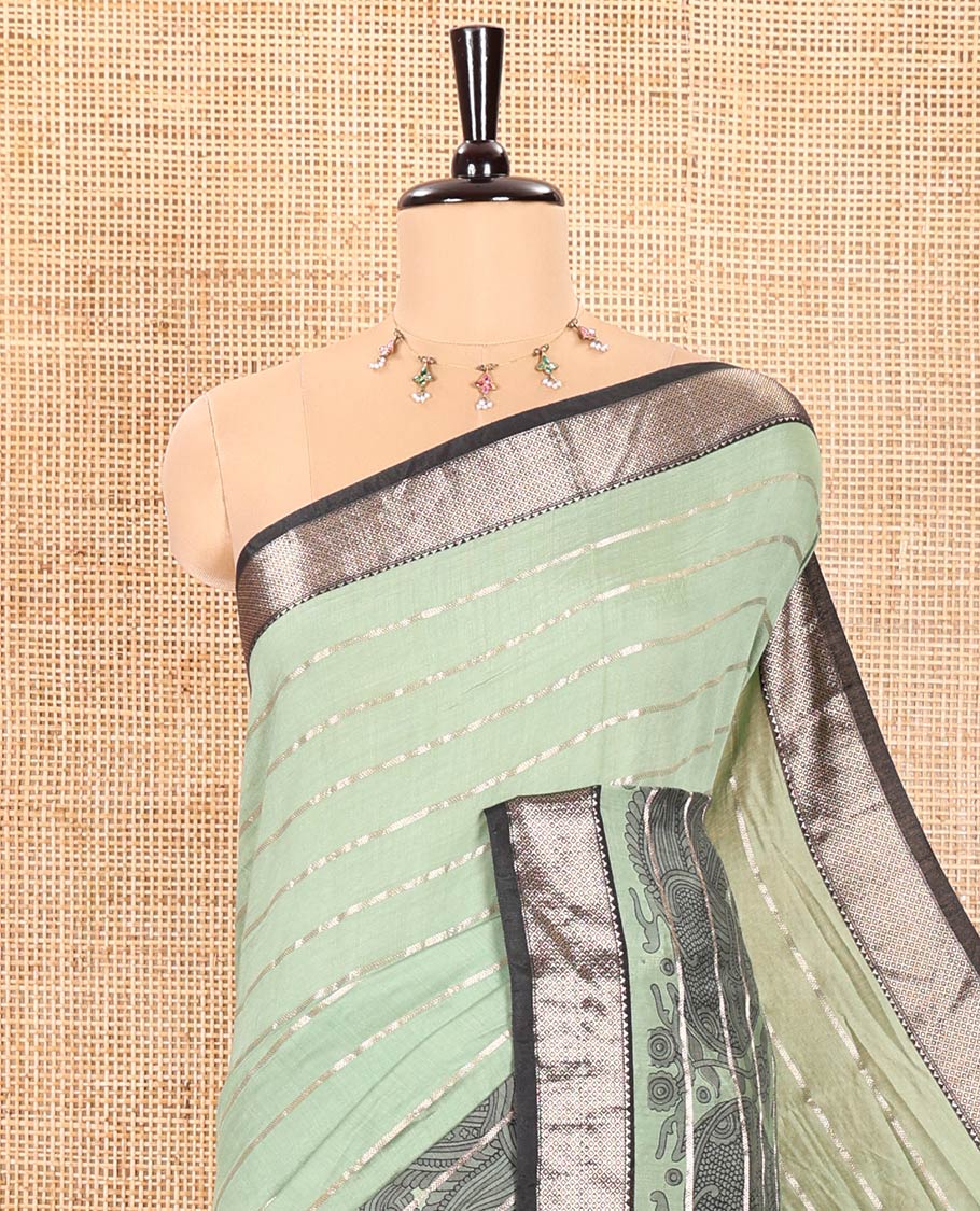 Pista Green Assam Cotton Saree Adorned with Horizontal Zari Stripes and Kalamkari Peacock Print, Complemented by a Contrast Traditional Zari Design Border, Gleaming Zari Woven Pallu, and a Contrast Zari Design Blouse
