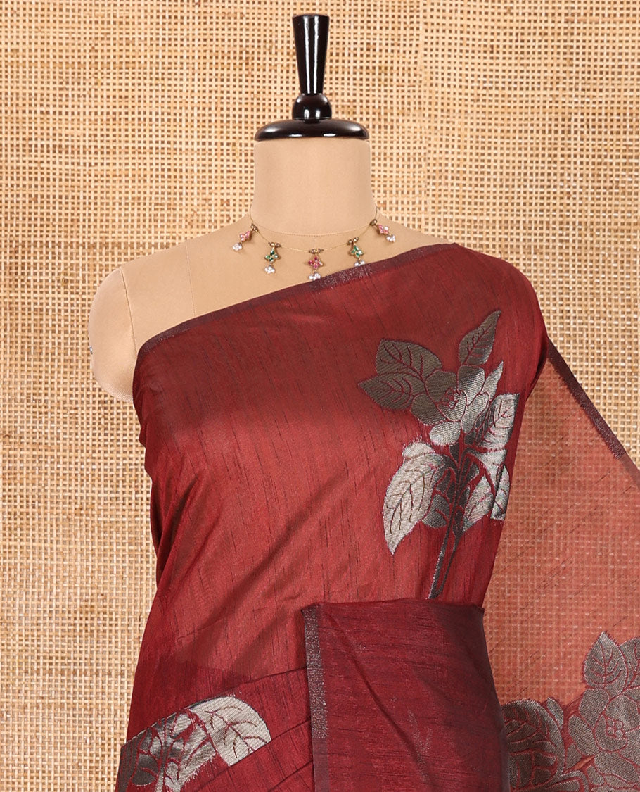 Borderless Maroon Kicha Tussar Saree Artfully Woven with Big Zari Floral Motifs All Over Its Body, Complemented by Intricately Zari-Woven Pallu, and a Contrast Blouse