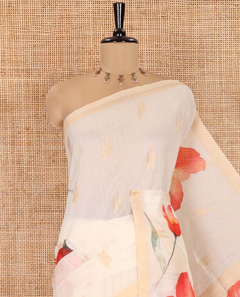 Cream Banaras Tissue Saree, Adorned with Floral Motifs Print and Zari Buttas on Its Body, Subtly Bordered, Pallu Pictures Floral Prints, and Paired with a Matching Printed Blouse