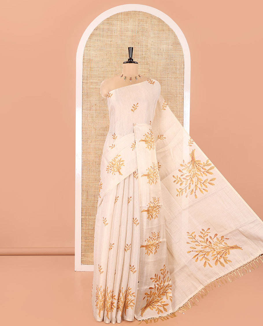 Cream Tissue Saree, Entralled with Leaf Motifs Printed On Its Body, Self-Border, Floral Printed Pallu, and Paired with a Printed Blouse