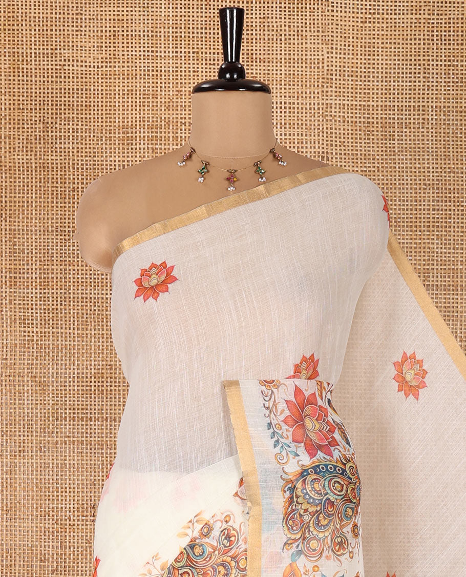 Cream Linen Cotton Saree, Elevated with Lotus, Floral, Elephant, and Peacock Motifs Printed on Its Body, Subtle Piping Border, a Self-Pallu, and Paired with a Matching Blouse