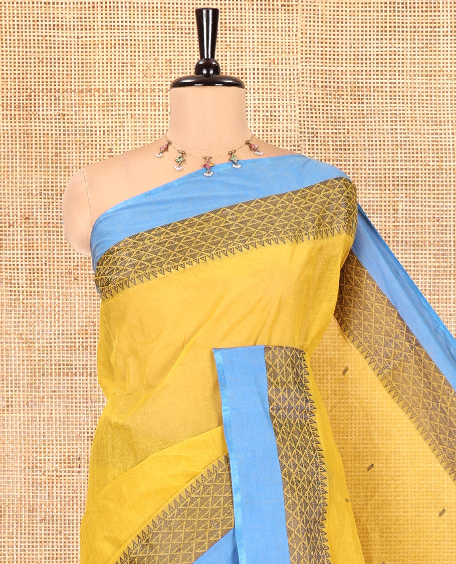 Yellow Bengal Cotton Saree, Subtly Woven with Thread Buttas All Over Its Body, Complemented by a Contrast Border of Temple and Jaal Designs, Pallu of Stripes and Buttas, and Comes Without a Blouse